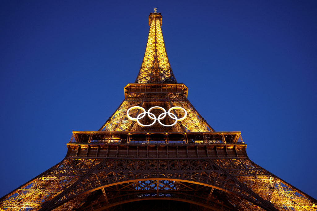 Paris Olympics organizers unveil the 5 Olympic rings mounted on the Eiffel  Tower | PBS News