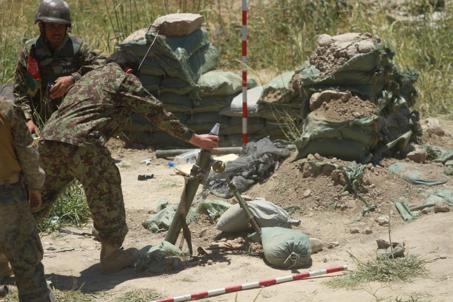 An_Afghan_National_Army_(ANA)_soldier_fires_a_60_mm_mortar_round_at_enemy_positions_in_the_Sangin_district,_Helmand_province,_Afghanistan,_May_29,_2013,_during_Operation_38_Eagle_130529-M-TM093-042.jpg